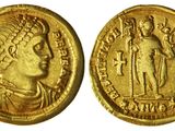une pièce d'or portant l'image d'un homme et d'une femme