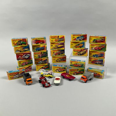 a lot of toy cars that are sitting on a table