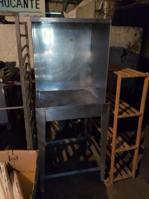a metal shelf with a metal shelf on top of it