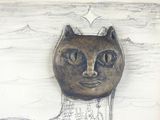a drawing of a cat that is sitting on a table