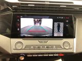 a picture of a car ' s rear view camera in the dash