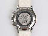 an image of a close up of a wrist watch on a white surface