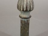 a small metal object that is sitting on a table