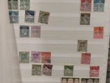 a picture of a refrigerator with a lot of stamps on it
