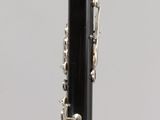 a close up of a black pen with a silver ballpoint