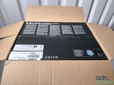 a cardboard box with a label on it that says krups