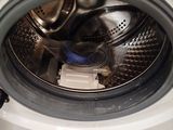 a washing machine that is sitting on a pallet