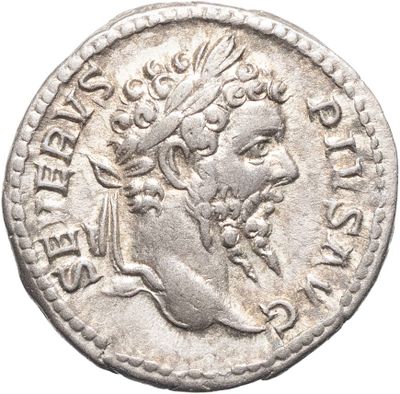 une pièce d'argent portant l'image d'un homme