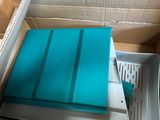 a box that has a blue tray inside of it
