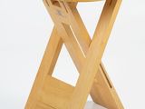 wooden folding stool on white background with white background