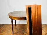a small table with a door open on the floor