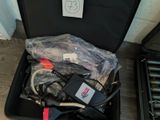 a suitcase with a bunch of electrical equipment in it