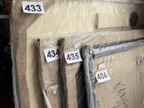a lot of boxes of mattresses in a warehouse