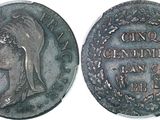 a close up of a coin with an image of a woman on it