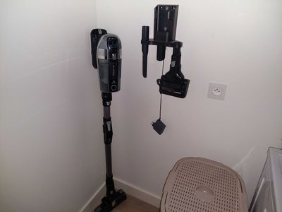two parking meters in the corner of a room
