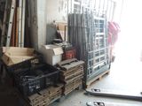many boxes and crates on the floor in the garage