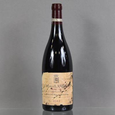 a bottle of wine that is sitting on a table