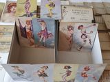 many cards that are in a box on a table