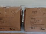 two cardboard boxes sitting on top of a table