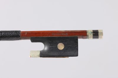 violin bow made of wood and metal with a black handle