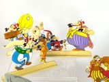 a bunch of cartoon figurines that are on display