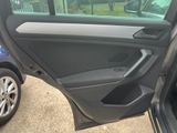 the door of a car with the door open showing the inside of it