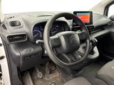 the interior of a car with a steering wheel, dashboard, and dash board