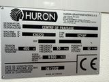 a metal sign on the wall of a building that says huron