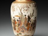 a vase that has a painting on it on it