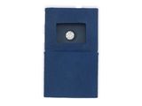 a close up of a blue case with a diamond in it