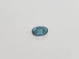 a blue diamond on a white surface