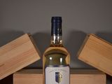 a bottle of wine that is sitting on a table
