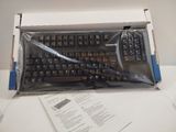 a box with a keyboard inside of it on a table