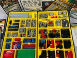 a box of legos sitting on a table next to a box of legos