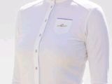 a woman that is wearing a white shirt and white pants
