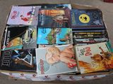 a box full of books that are sitting on the floor