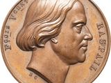 une image montrant un gros plan d'une pièce de monnaie sur laquelle figure le visage d'un homme