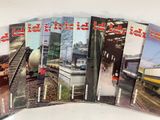 several magazines of trains are stacked on top of each other
