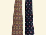 two ties with different designs on them on a white background