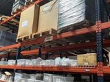 many boxes and boxes on the shelves in the warehouse