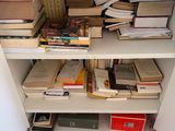 a book shelf with many books on it