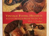 the book cover of vintage flying helmets is shown with a pair of goggles