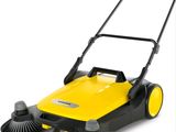 a yellow and black sweeper on a white background