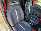 three seats in the back of a small car