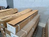 many cardboard boxes stacked on top of each other in a warehouse