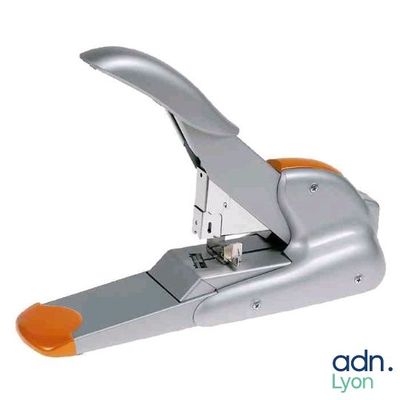 a stapler with a stapler attached to it