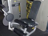 a machine that is sitting on the floor in the gym