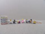 a lot of action figures that are on the floor
