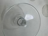 several empty wine glasses are sitting on a counter top