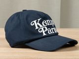 a picture of a baseball cap on a wooden table